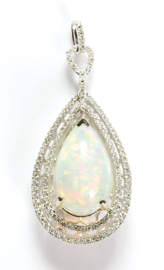 Appraisal: OPAL DIAMOND AND FOURTEEN KARAT GOLD PENDANT The white gold