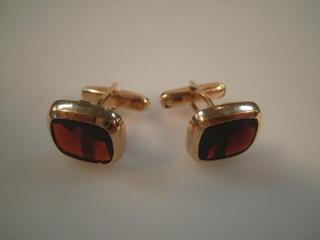 Appraisal: A pair of garnet set bar cuff links stamped