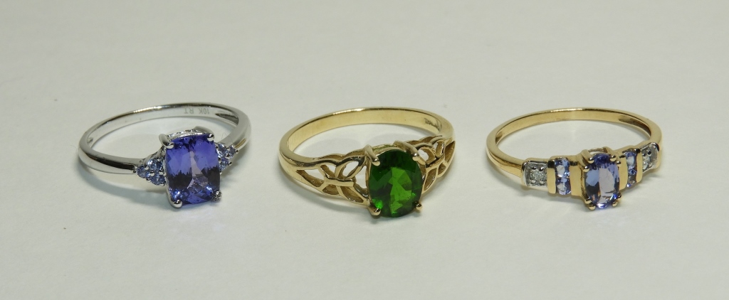 Appraisal: AMETHYST DIAMOND EMERALD LADY'S RINGS ContemporaryIncludes an emerald ring light