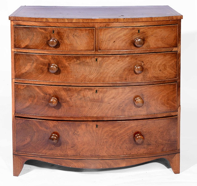 Appraisal: A th Century mahogany bow front chest of two short