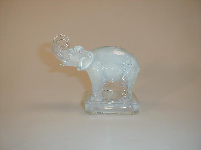 Appraisal: A Joblin opalescent pressed glass elephant on square hollow base