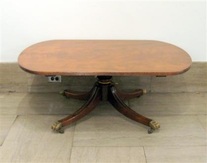 Appraisal: Georgian style mahogany low table The oval top with a