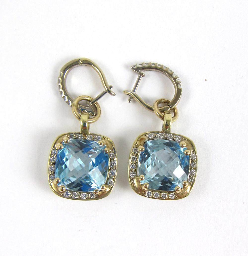 Appraisal: PAIR OF BLUE TOPAZ AND DIAMOND DANGLE EARRINGS with a