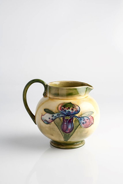 Appraisal: Moorcroft'Orchid' jugmanufacturer's 'Potter to the Late Queen Mary' paper label