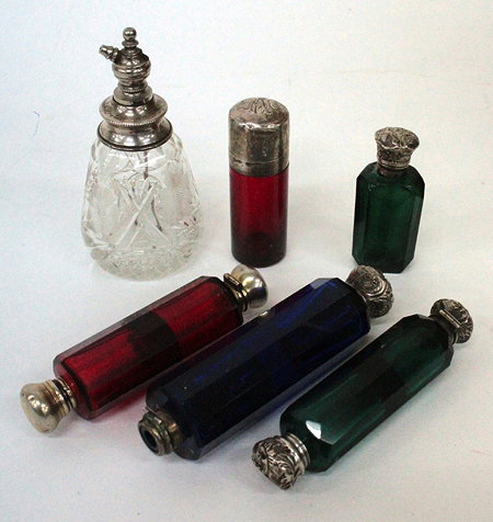 Appraisal: A COLLECTION OF SIX VARIOUS COLOURED AND CLEAR GLASS SCENT