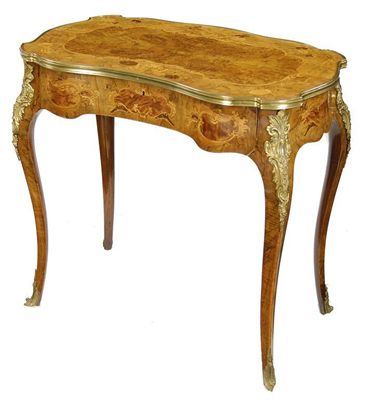 Appraisal: A late th century walnut and marquetry serpentine occasional table