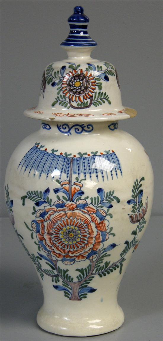 Appraisal: Delft baluster vase and cover th century painted with flowers