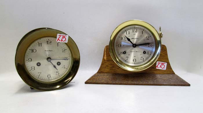 Appraisal: TWO SHIPS BELL CLOCKS one manufactured by Waterbury Clock Co