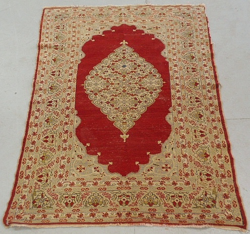 Appraisal: - Persian oriental mat with red field and floral patterns