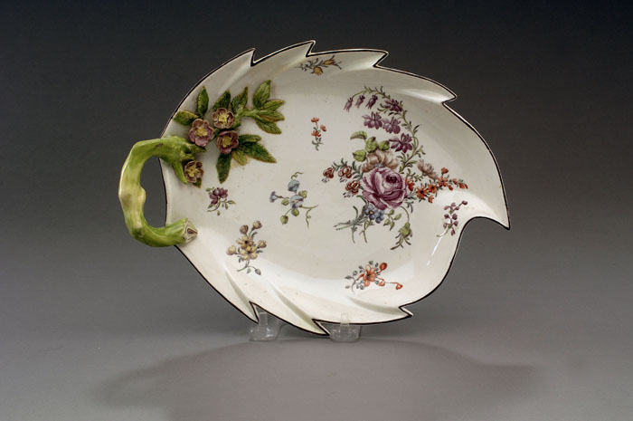 Appraisal: CHELSEA PORCELAIN LEAF-SHAPED DISH CIRCA - Painted with a floral