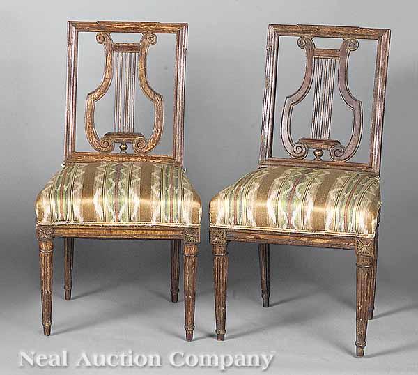 Appraisal: A Pair of Italian Neo-Classical Painted Fruitwood Dining Chairs c