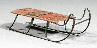 Appraisal: Painted wood and iron sled traces of old paint with