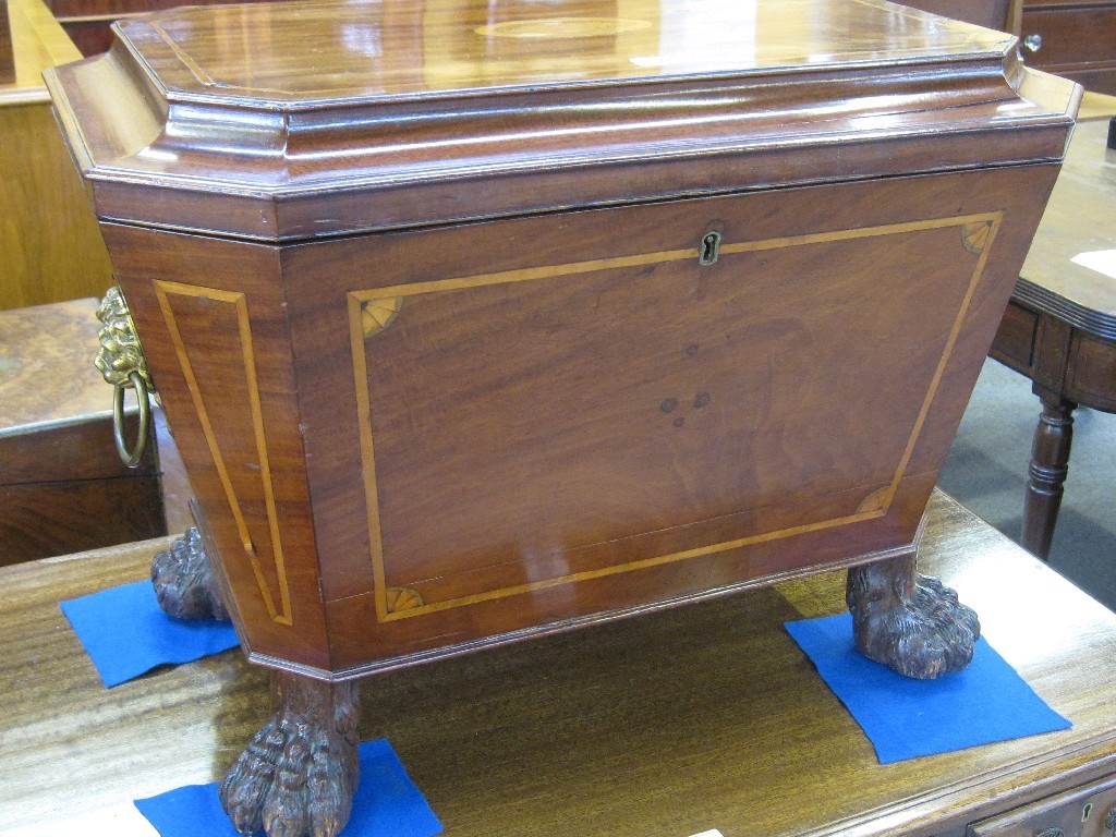 Appraisal: Regency mahogany and inlaid sarcophagus shaped wine cooler with lions