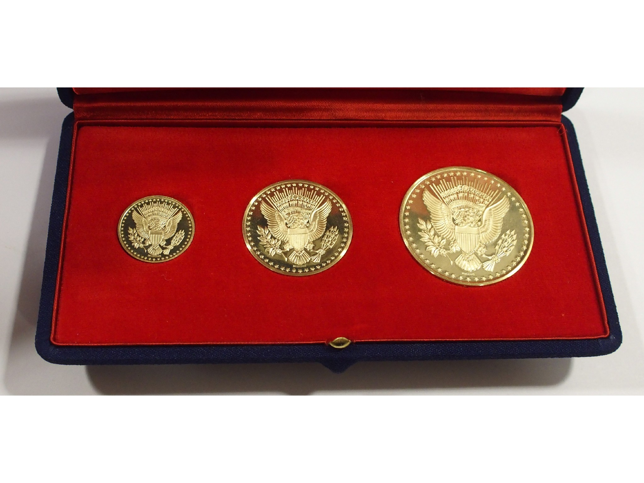 Appraisal: Three ct gold J F Kennedy commemorative medallionswith certificates Metal