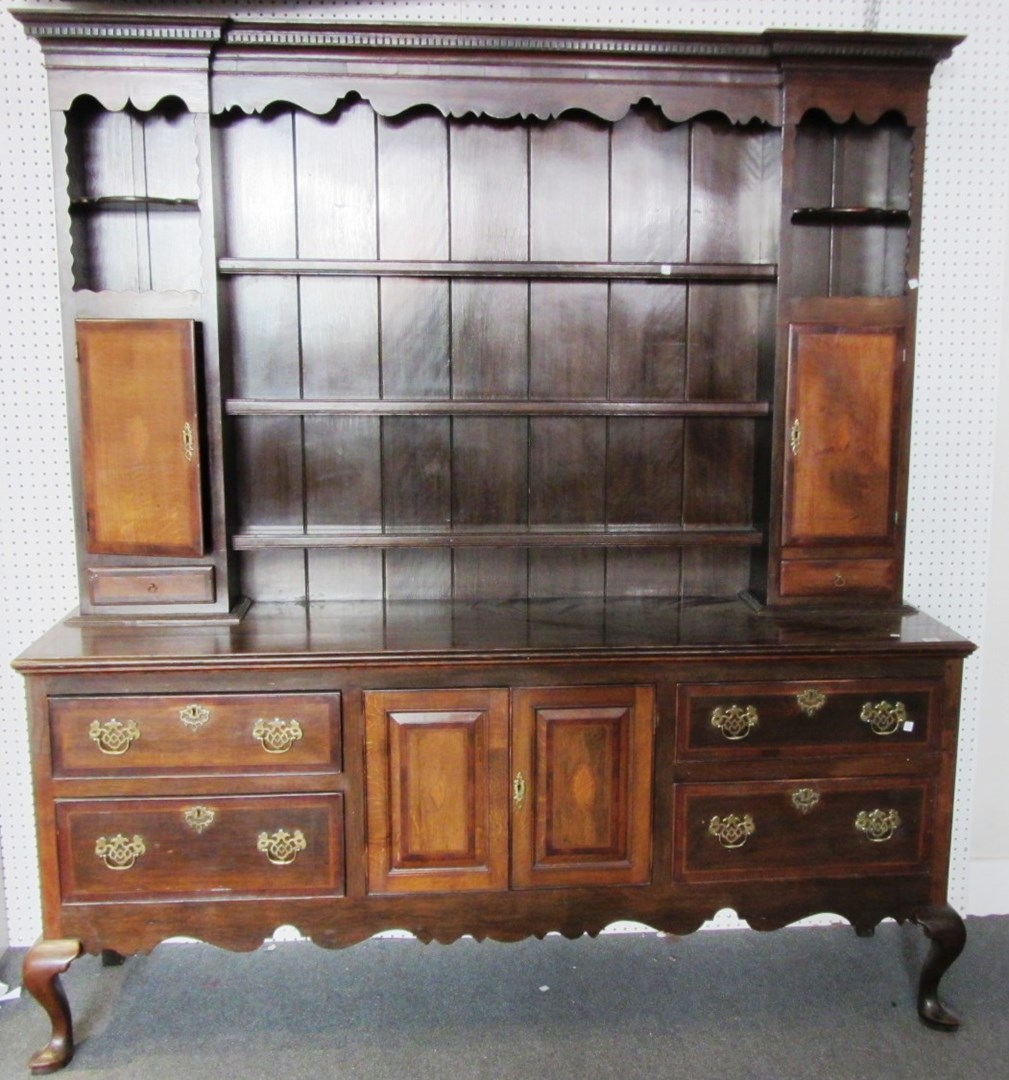 Appraisal: An th century and later oak dresser the enclosed three