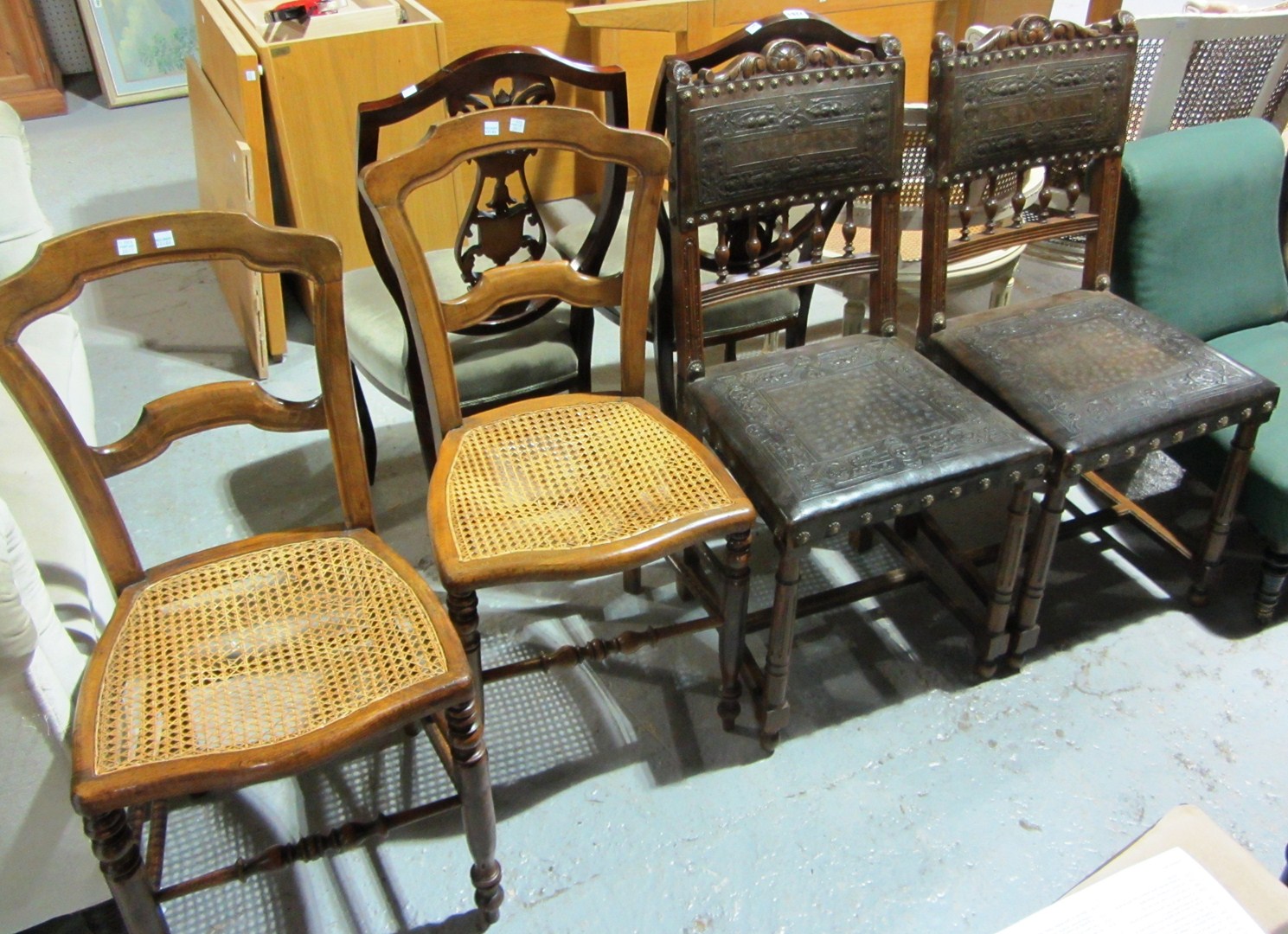 Appraisal: A pair of walnut and leather dining chairs and a