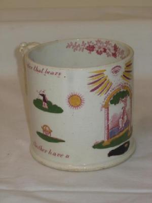 Appraisal: A STAFFORDSHIRE POTTERY MASONIC MUG with leaf and scroll handle