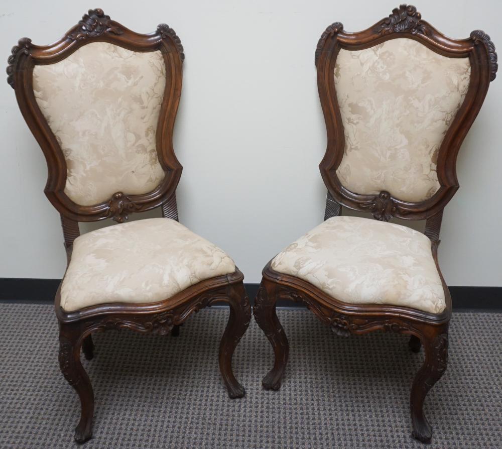 Appraisal: Pair of Victorian Rococo Style Carved Walnut and Upholstered Side