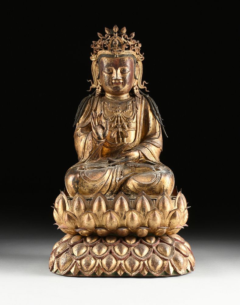 Appraisal: A MING DYNASTY GILT AND LACQUERED BRONZE BODHISATTVA FIGURE ON