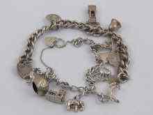 Appraisal: Two silver charm bracelets with a total of twelve charms