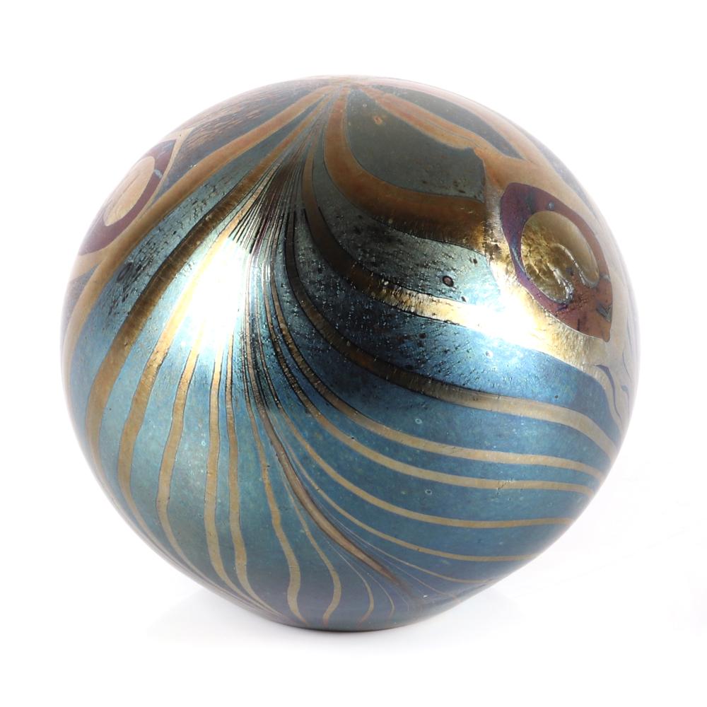 Appraisal: JOHN DITCHFIELD GLASFORM GLOBE PAPERWEIGHT WITH IRIDESCENT PEACOCK FEATHER DESIGN