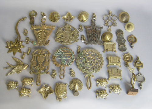 Appraisal: Group of brass to include horse brasses trivets paperweights etc