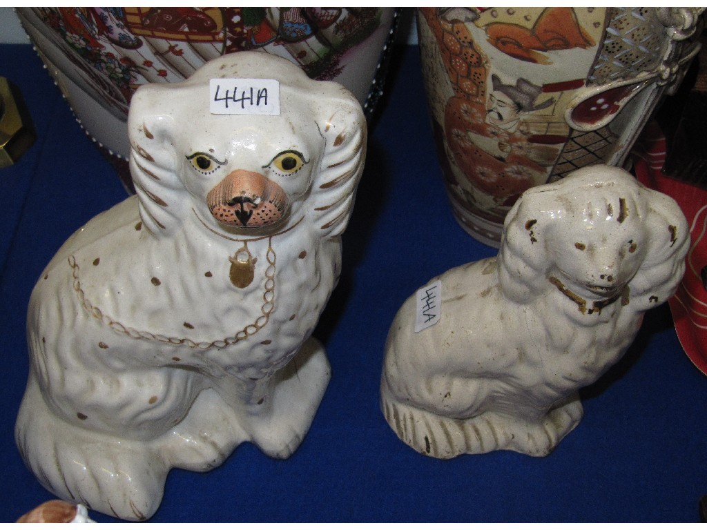 Appraisal: Two Staffordshire wally dugs