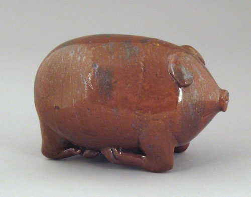 Appraisal: Pennsylvania redware pig flask th c with manganese splash decoration