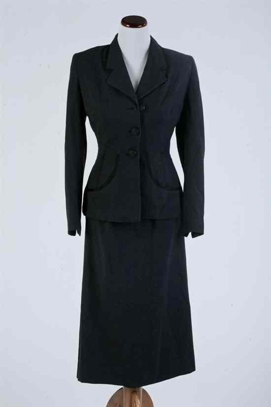 Appraisal: VINTAGE ELSA SCHIAPARELLI CHARCOAL GREY WOOL SKIRT SUIT With black