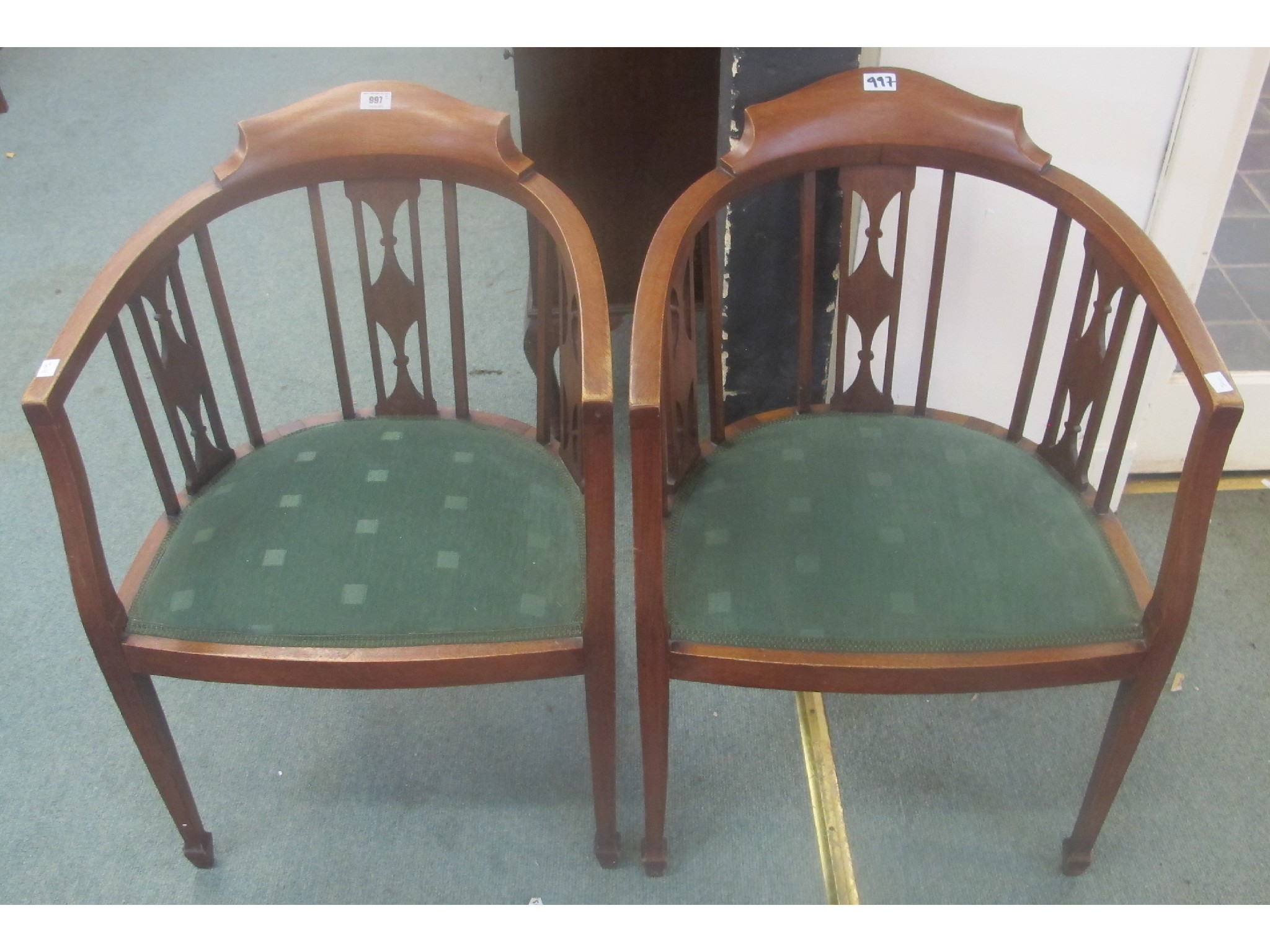 Appraisal: A pair of mahogany bow back parlour chairs