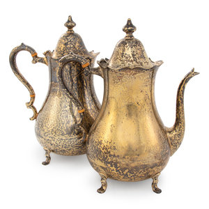 Appraisal: A Pair of Cartier Silver-Gilt Teapots th Century each stamped