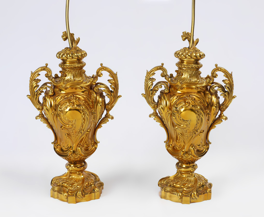 Appraisal: PAIR OF FRENCH GILT BRONZE ROCOCO LAMPS Ornate foliate scroll