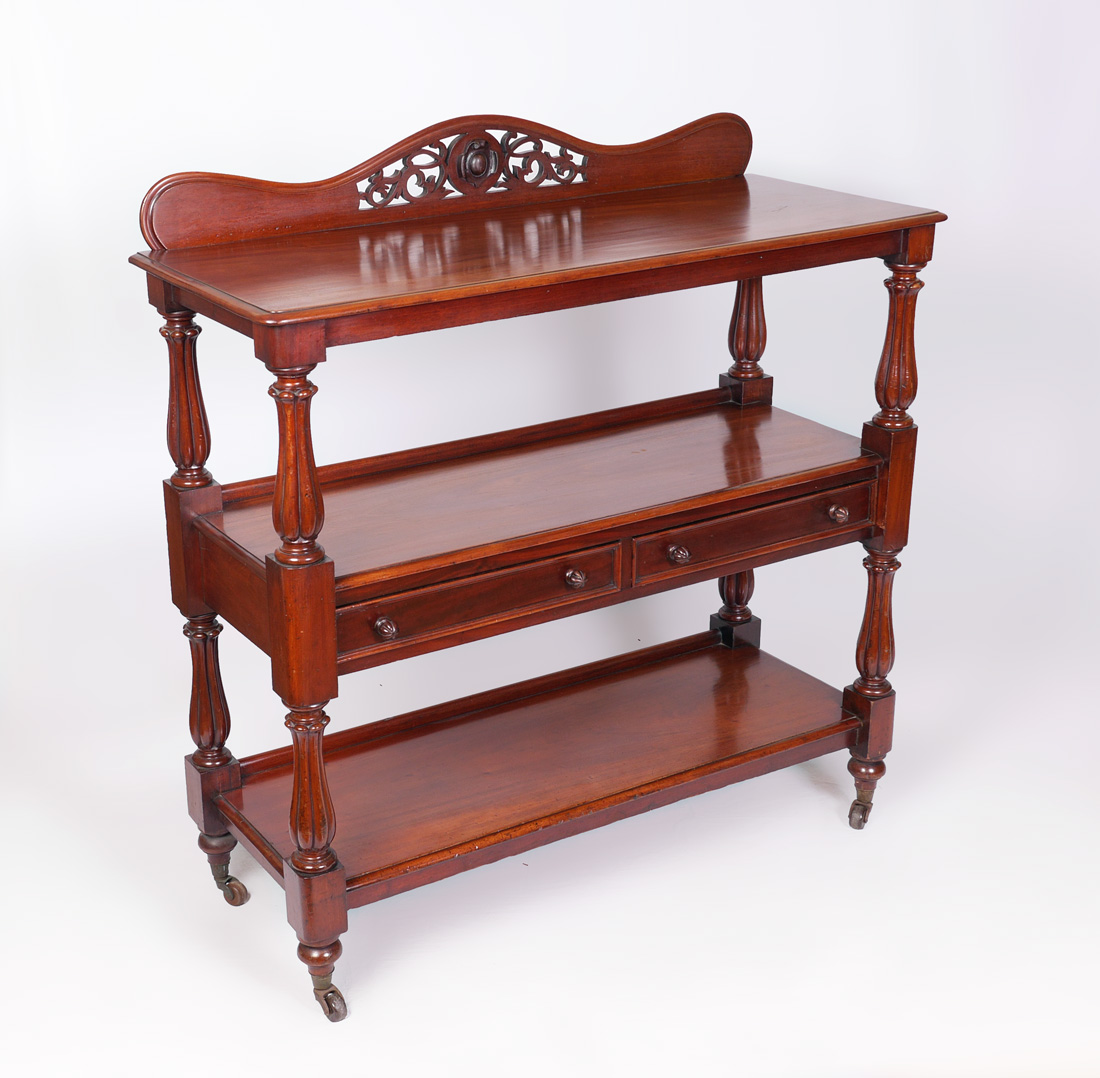 Appraisal: VICTORIAN MAHOGANY TIER SERVER OR BUTLERS TROLLY Shaped crest with