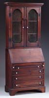 Appraisal: TWO PIECE PINE SECRETARY Bottom section having a slant lid