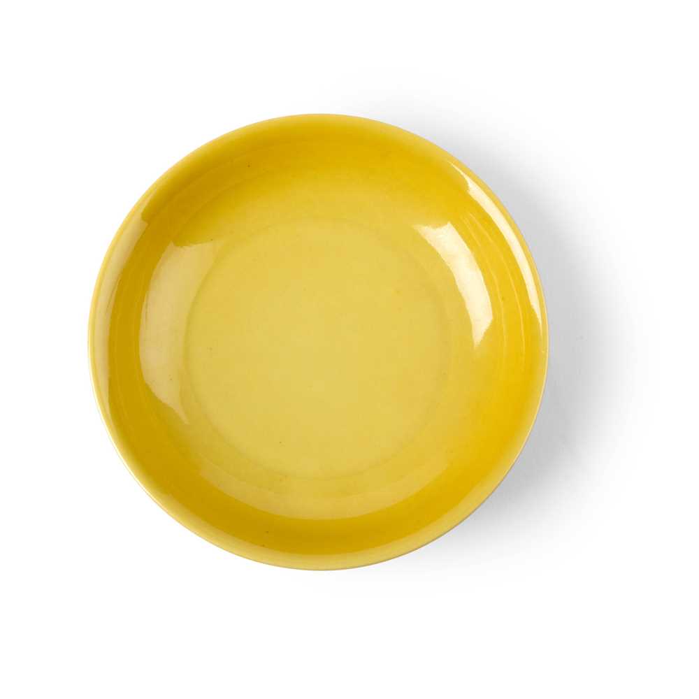 Appraisal: YELLOW-GLAZED DISH XUANDE MARK BUT POSSIBLY QING DYNASTY with rounded