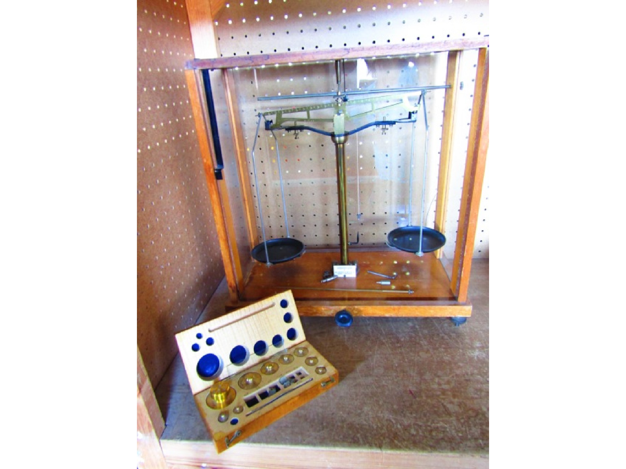 Appraisal: A th century timber cased set of laboratory scales with