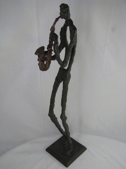 Appraisal: Tall bronze statue of a saxophone player Unsigned Measures tall