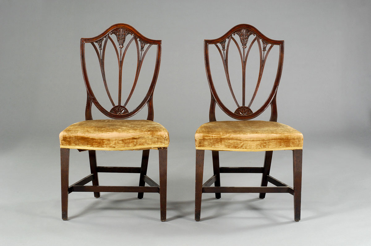 Appraisal: PAIR OF MASSACHUSETTS FEDERAL CARVED MAHOGANY SHIELD-BACK SIDE CHAIRS PROBABLY