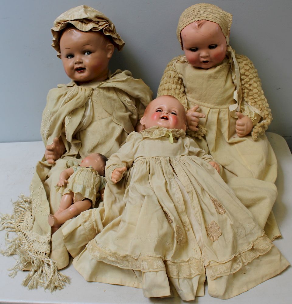 Appraisal: Antique Dolls In Original Clothes Large baby blue eyes -