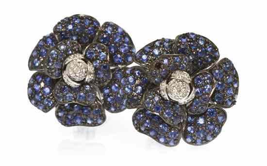 Appraisal: A Pair of Karat Gold Sapphire and Diamond Flower Earclips