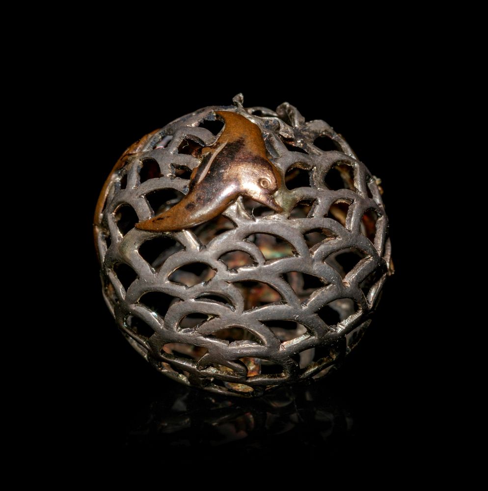 Appraisal: A Mixed Metal Reticulated Bead-Form Ojime A Mixed Metal Reticulated