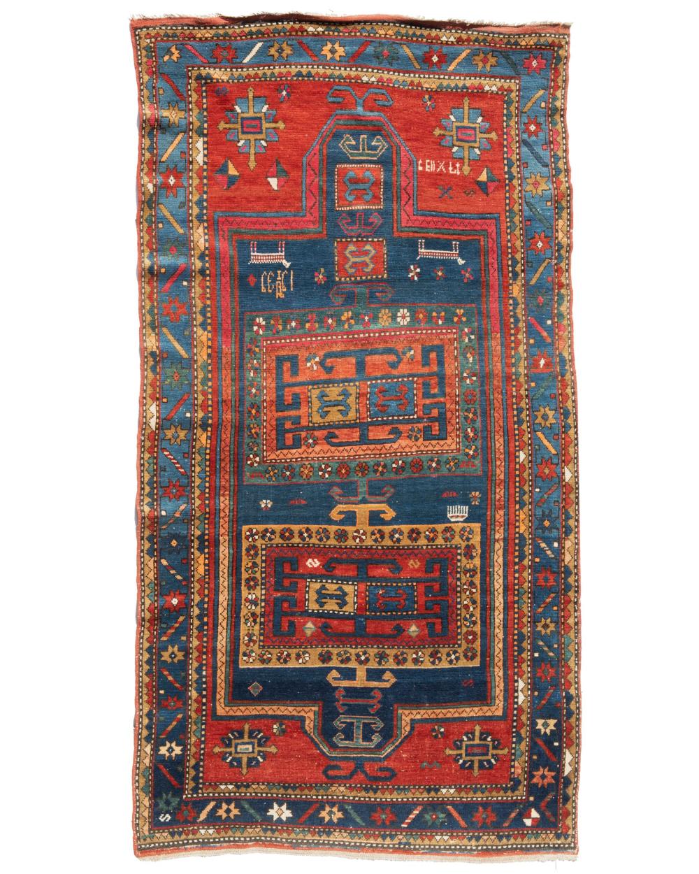 Appraisal: A Caucasian area rug First-Quarter th Century Dated in weaving