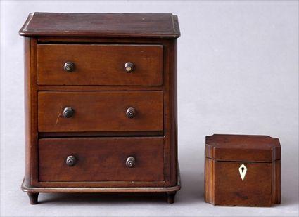 Appraisal: VICTORIAN MAHOGANY MINIATURE CHEST OF THREE DRAWERS AND A TEA