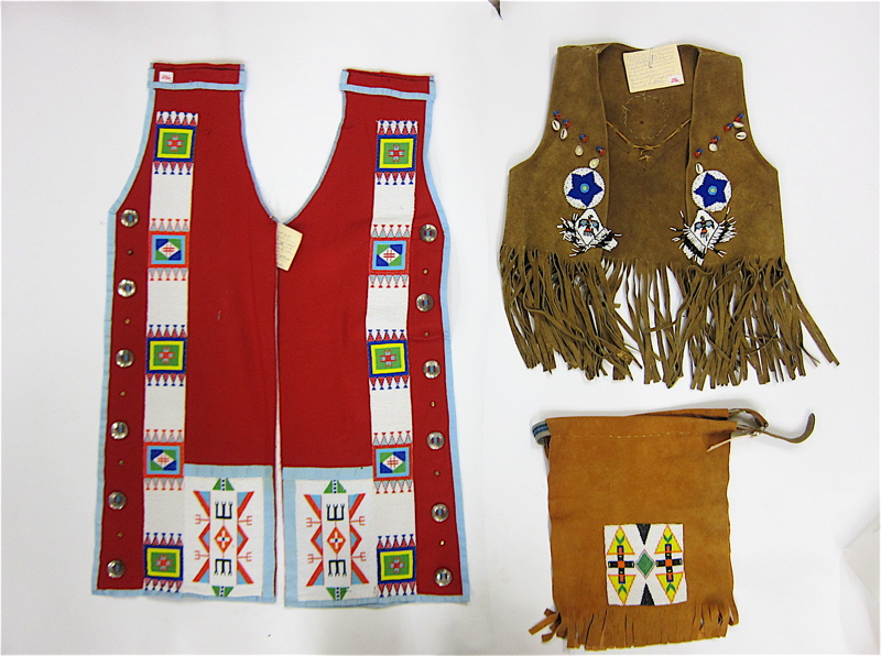 Appraisal: NATIVE AMERICAN LEGGINGS BREECH CLOTH AND VEST the red wool