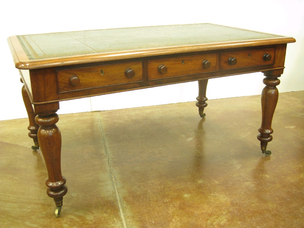 Appraisal: A Victorian mahogany Library Desk with inset top fitted nine