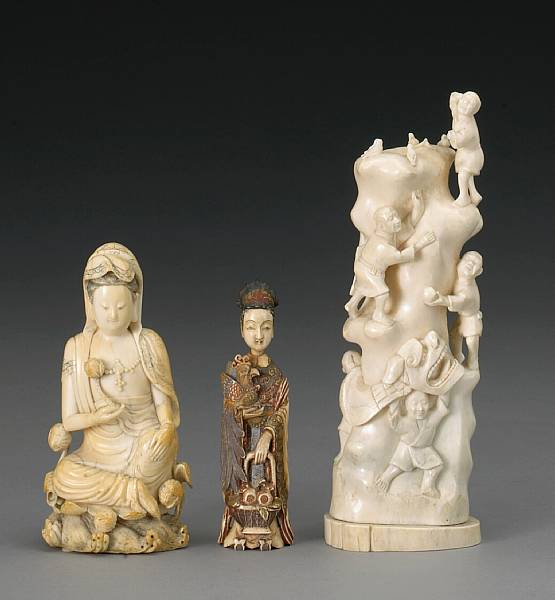 Appraisal: A group of three Asian carved ivory decorations th Century