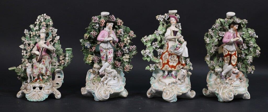 Appraisal: figural porcelain candlesticks with bocage backgrounds attributed to Derby Tallest