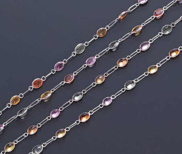 Appraisal: A multi-color sapphire long chain necklace mounted in eighteen karat