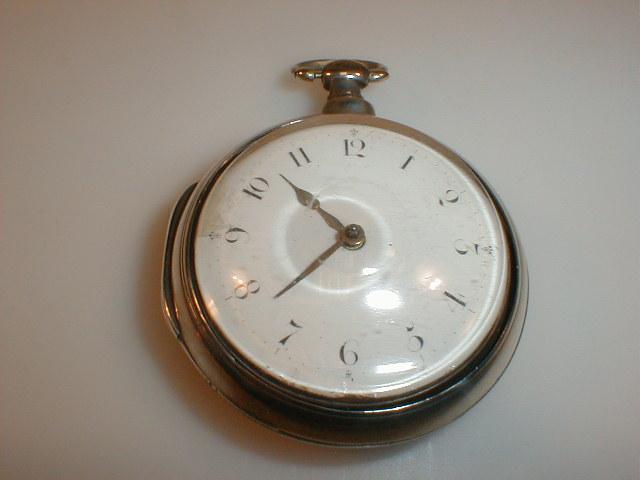 Appraisal: A silver pair cased open face pocket watch dust cover