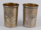 Appraisal: A pair of Russian silver vodka tots Pyetr Abrosinov Moscow